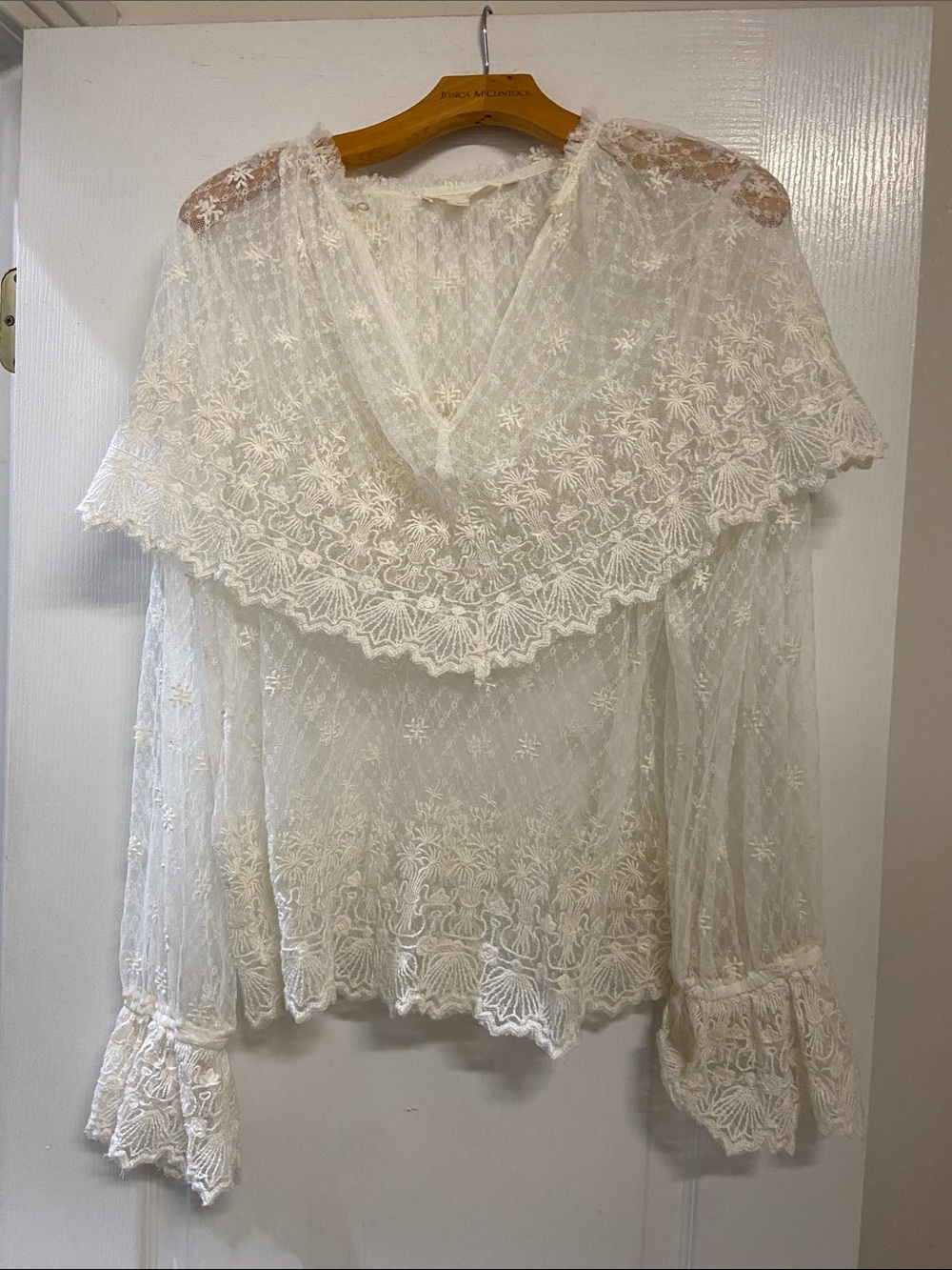 Sheer Ivory Lace V-Neck Blouse with Ruffled Yoke